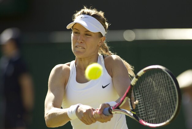Jun 30, 2015; London, United Kingdom; Eugenie Bouchard (CAN) in action during her match against Ying-Ying Duan (CHN) on day two of The Championships Wimbledon at the AELTC. Mandatory Credit: Susan Mullane-USA TODAY Sports