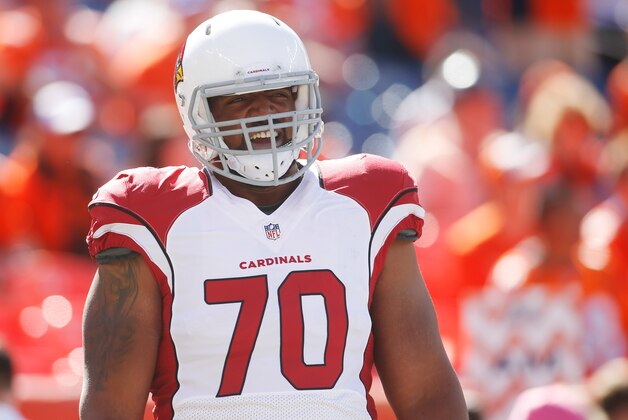 Oct 5, 2014; Denver, CO, USA; Arizona Cardinals tackle Bobby Massie (70)  before the game against the Denver Broncos at Sports Authority Field at Mile High. Mandatory Credit: Chris Humphreys-USA TODAY Sports