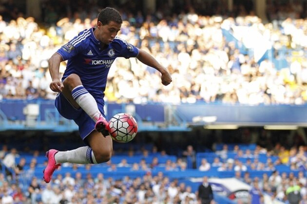 Chelsea's Belgian midfielder Eden Hazard controls the ball during the English Premier League football match between Chelsea and Swansea City at Stamford Bridge in London on August 8, 2015. AFP PHOTO / IAN KINGTON

RESTRICTED TO EDITORIAL USE. No use with unauthorized audio, video, data, fixture lists, club/league logos or 'live' services. Online in-match use limited to 75 images, no video emulation. No use in betting, games or single club/league/player publications.        (Photo credit should read IAN KINGTON/AFP/Getty Images)