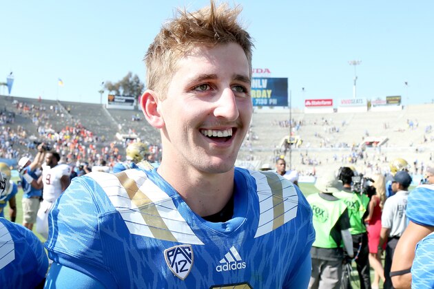 PASADENA, CA - SEPTEMBER 05:   Quarterback Josh Rosen #3 of the UCLA Bruins smiles as he walks off the field after the game with the Virginia Cavaliers at the Rose Bowl on September 5, 2015 in Pasadena, California.  UCLA won 34-16.  (Photo by Stephen Dunn/Getty Images)