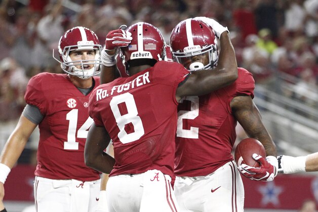Sep 5, 2015; Arlington, TX, USA; Alabama Crimson Tide running back Derrick Henry (2) celebrates scoring a touchdown against the Wisconsin Badgers with wide receiver Robert Foster (8) and quarterback Jake Coker (14) during the third quarter at AT&T Stadium. Mandatory Credit: Tim Heitman-USA TODAY Sports