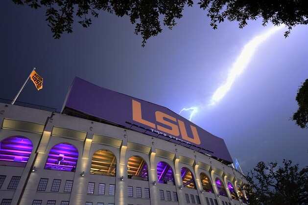 BATON ROUGE, LA - SEPTEMBER 05:  Lightning strikes outside of Tiger Stadium during a weather delay between the LSU Tigers and the McNeese State Cowboys on September 5, 2015 in Baton Rouge, Louisiana.  (Photo by Stacy Revere/Getty Images)