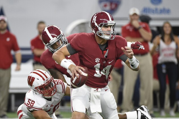 Sep 5, 2015; Arlington, TX, USA; Wisconsin Badgers linebacker Joe Schobert (58) sacks Alabama Crimson Tide quarterback Jake Coker (14) during the first quarter at AT&T Stadium. Mandatory Credit: Richard Mackson-USA TODAY Sports