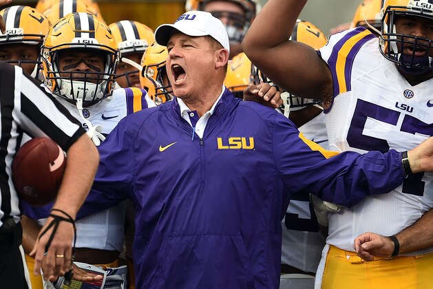 BATON ROUGE, LA - SEPTEMBER 05:  Head coach Les Miles of the LSU Tigers leads his team onto the field prior to a game against the McNeese State Cowboys at Tiger Stadium on September 5, 2015 in Baton Rouge, Louisiana.  (Photo by Stacy Revere/Getty Images)