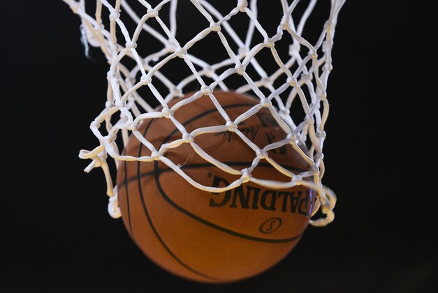 December 2, 2014; Oakland, CA, USA; Detail view of a basketball going through the basket net during the fourth quarter between the Golden State Warriors and the Orlando Magic at Oracle Arena. The Warriors defeated the Magic 98-97. Mandatory Credit: Kyle Terada-USA TODAY Sports