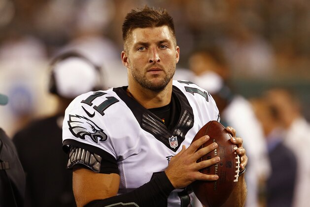 EAST RUTHERFORD, NJ - SEPTEMBER 03: Quarterback Tim Tebow #11 of the Philadelphia Eagles warms up on the sidelines against the New York Jets in the third quarter during a pre-season game at MetLife Stadium on September 3, 2015 in East Rutherford, New Jersey. (Photo by Rich Schultz /Getty Images)