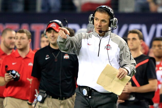 ARLINGTON, TX - JANUARY 12:  Head Coach Urban Meyer of the Ohio State Buckeyes points in the second half against the Oregon Ducks during the College Football Playoff National Championship Game at AT&T Stadium on January 12, 2015 in Arlington, Texas.  (Photo by Jamie Squire/Getty Images)
