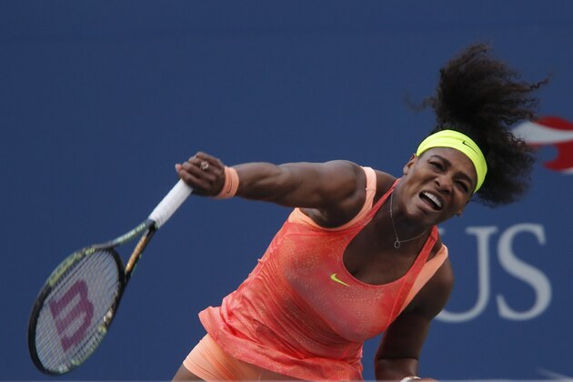 Serena Williams of the US serves to compatriot Madison Keys during their 2015 US Open Women's singles round 4 match at the USTA Billie Jean King National Tennis Center September 6, 2015 in New York. AFP PHOTO/KENA BETANCUR        (Photo credit should read KENA BETANCUR/AFP/Getty Images)