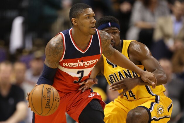Apr 14, 2015; Indianapolis, IN, USA; Washington Wizards guard Bradley Beal (3) is guarded by Indiana Pacers forward Solomon Hill (44) at Bankers Life Fieldhouse. Indiana defeats Washington 99-95 in double overtime. Mandatory Credit: Brian Spurlock-USA TODAY Sports