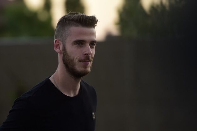 Manchester United's goalkeeper David de Gea arrives at Las Rozas' Soccer City on September 1, 2015. Real Madrid have blamed Manchester United for the collapse of goalkeeper David de Gea's move to the Spanish giants, claiming the English side sent the documents needed to complete the deal after the Spanish transfer deadline had passed. AFP PHOTO/ PIERRE-PHILIPPE MARCOU        (Photo credit should read PIERRE-PHILIPPE MARCOU/AFP/Getty Images)