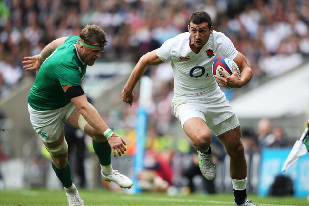 LONDON, ENGLAND - SEPTEMBER 05:  Jonny May of England charges past Jamie Heaslip of Ireland during the QBE International match between England and Ireland at Twickenham Stadium on September 5, 2015 in London, England.  (Photo by Shaun Botterill/Getty Images)