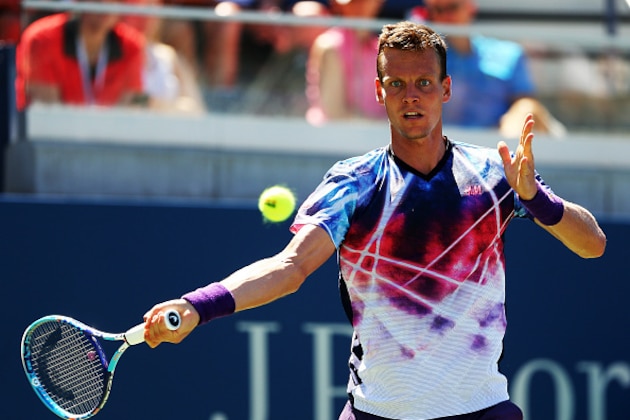 NEW YORK, NY - SEPTEMBER 05:  Tomas Berdych of the Czech Republic returns a shot to Guillermo Garcia-Lopez of Spain during their Men's Singles Third Round match on Day Six of the 2015 US Open at the USTA Billie Jean King National Tennis Center on September 5, 2015 in the Flushing neighborhood of the Queens borough of New York City.  (Photo by Elsa/Getty Images)