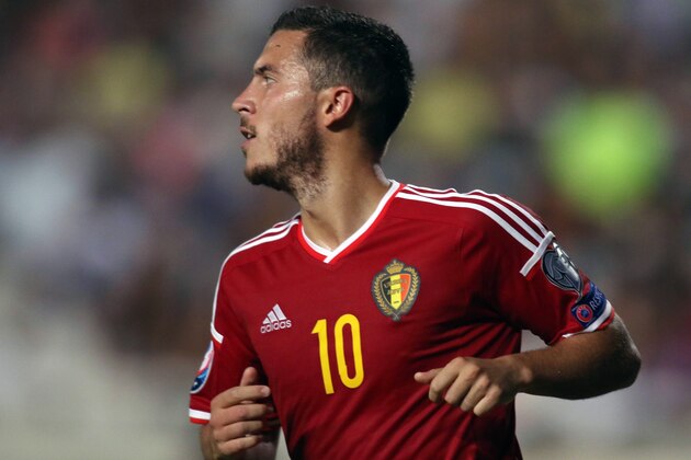 Belgium's Eden Hazard celebrates after scoring a goal during their EURO 2016 qualifying football match between Cyprus and Belgium at the Neo GSP stadium in the Cypriot capital, Nicosia, on September 6, 2015. AFP PHOTO / SAKIS SAVVIDES        (Photo credit should read SAKIS SAVVIDES/AFP/Getty Images)