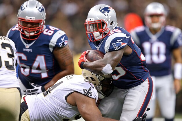 Aug 22, 2015; New Orleans, LA, USA; New England Patriots running back Jonas Gray (35) is tackled by New Orleans Saints defensive end Cameron Jordan (94) in the second quarter at Mercedes-Benz Superdome. Mandatory Credit: Chuck Cook-USA TODAY Sports