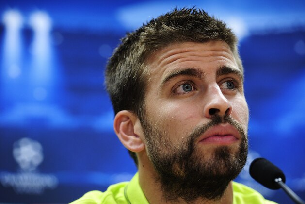 Barcelona's defender Gerard Pique gives a press conference at the Sports Center FC Barcelona Joan Gamper in Sant Joan Despi, near Barcelona, on September 16, 2014, on the eve of the UEFA Champions league football match FC Barcelona vs Apoel FC. AFP PHOTO/ JOSEP LAGO        (Photo credit should read JOSEP LAGO/AFP/Getty Images)
