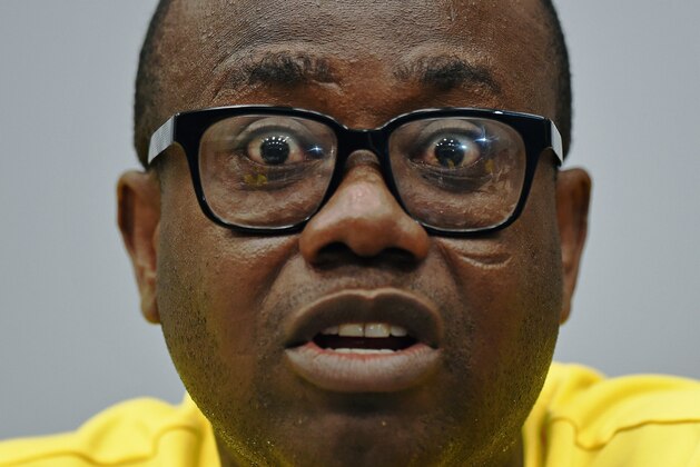 President of The Ghana Football Association, Kwesi Nyantakyi answers questions during a press conference in Maceio on June 23, 2014, during the 2014 FIFA World Cup. Nyantakyi gave an interview stating they will sue the UK's Daily Telegraph newspaper over its claim he agreed for the national team to play in two proposed matches which he would 'fix' after the World Cup. The allegations came after a joint undercover investigation by the Daily Telegraph and Channel 4 programme Dispatches. The investigation identified two people, one a FIFA licensed agent and the other a Ghana football association club official. The Ghana national football team will face Portugal in Brasilia on June 26, 2014 in their last first round group match of the 2014 FIFA World Cup.  AFP PHOTO / CARL DE SOUZA        (Photo credit should read CARL DE SOUZA/AFP/Getty Images)