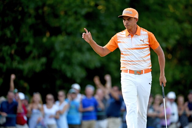 NORTON, MA - SEPTEMBER 07:  Rickie Fowler react after making a birdie putt on the 14th green during the final round of the Deutsche Bank Championship at TPC Boston on September 7, 2015 in Norton, Massachusetts.  (Photo by Ross Kinnaird/Getty Images)