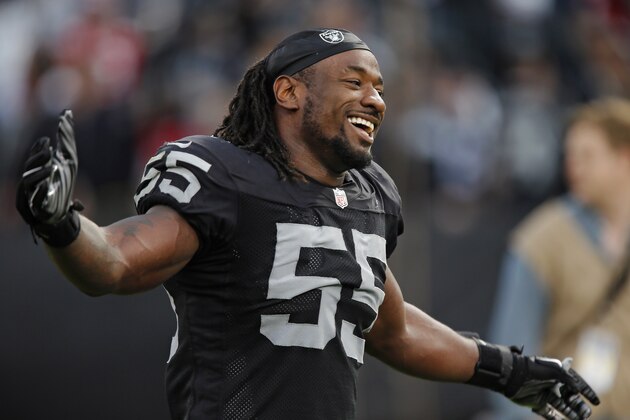 OAKLAND, CA - DECEMBER 7:  Linebacker Sio Moore #55 of the Oakland Raiders smiles and celebrates after defeating the San Francisco 49ers on December 7, 2014 at O.co Coliseum in Oakland, California.  The Raiders won 24-13.  (Photo by Brian Bahr/Getty Images)