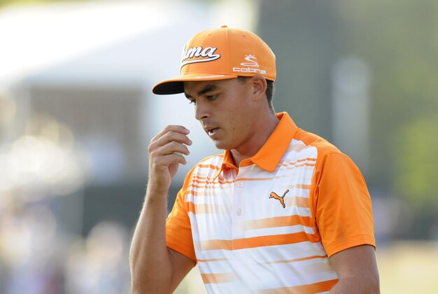 Sep 7, 2015; Norton, MA, USA; Rickie Fowler comes off the 16th green during the final round of the Deutsche Bank Championship at TPC of Boston. Mandatory Credit: Mark Konezny-USA TODAY Sports