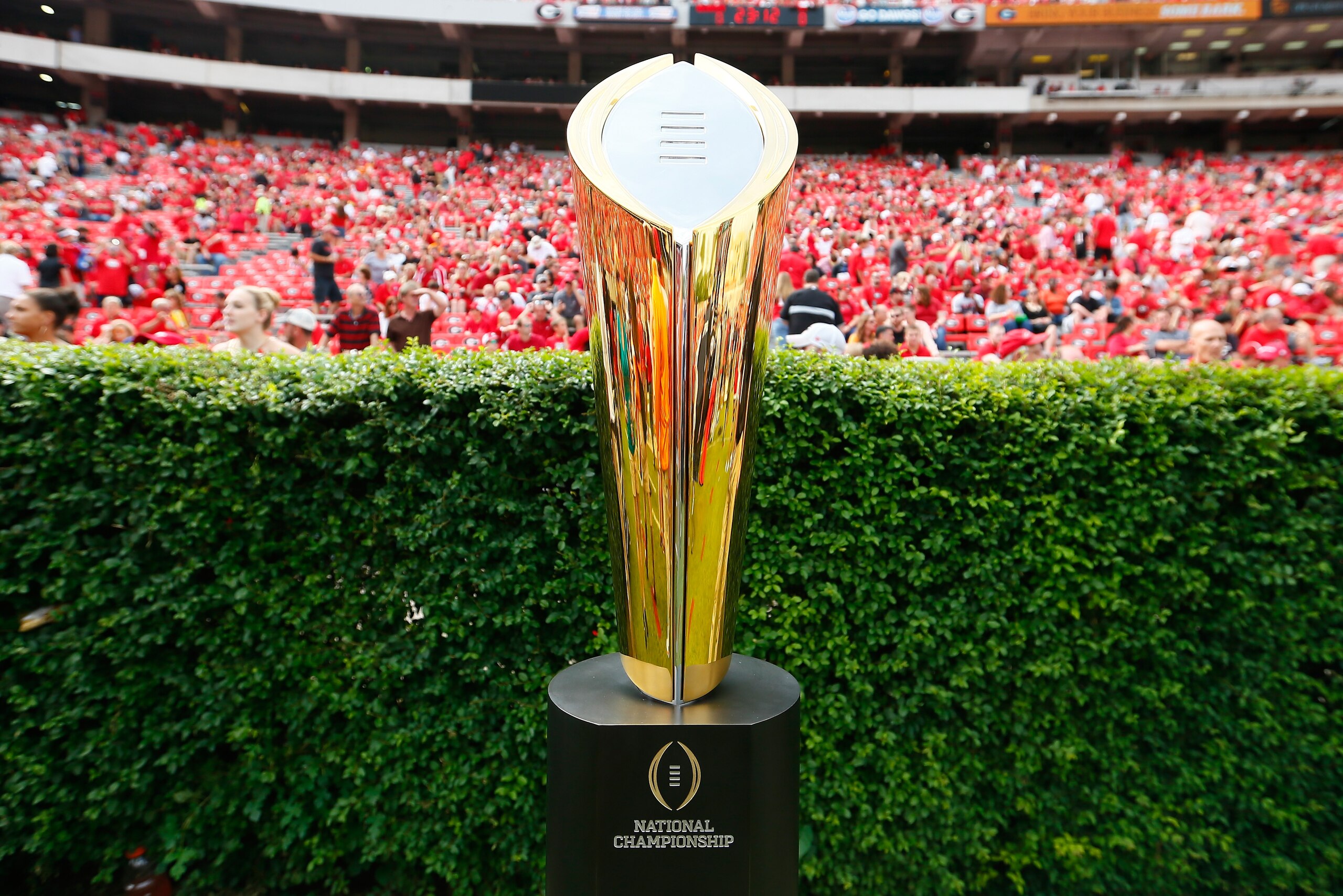 ATHENS, GA - SEPTEMBER 27:  The College Football Playoff National Championship Trophy is seen on the field prior to the game between the Georgia Bulldogs and the Tennessee Volunteers at Sanford Stadium on September 27, 2014 in Athens, Georgia.  (Photo by Kevin C. Cox/Getty Images)