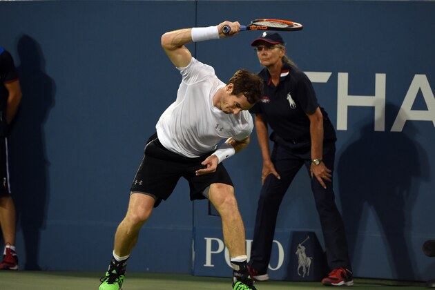 Andy Murray of the UK breaks his racket against Kevin Anderson of South Africa during their 2015 US Open men's singles round- four match at the USTA Billie Jean King National Tennis Center September 7, 2015  in New York.        AFP PHOTO /  TIMOTHY  A. CLARY        (Photo credit should read TIMOTHY A. CLARY/AFP/Getty Images)