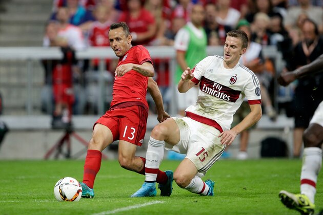 (L-R) Rafinha of FC Bayern Munchen, Rodrigo Ely of AC Milan during the AUDI Cup match between FC Bayern Munich and AC Milan on August 4, 2015 at the Allianz Arena in Munich, Germany(Photo by VI Images via Getty Images)