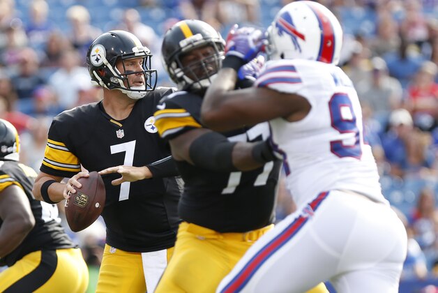 Aug 29, 2015; Orchard Park, NY, USA; Pittsburgh Steelers quarterback Ben Roethlisberger (7) looks to pass under pressure by Buffalo Bills defensive end Mario Williams (94) during the first quarter at Ralph Wilson Stadium. Mandatory Credit: Kevin Hoffman-USA TODAY Sports