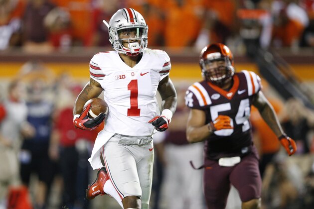 BLACKSBURG, VA - SEPTEMBER 7: Braxton Miller #1 of the Ohio State Buckeyes runs for a 53-yard touchdown in the third quarter against the Virginia Tech Hokies at Lane Stadium on September 7, 2015 in Blacksburg, Virginia. (Photo by Joe Robbins/Getty Images)