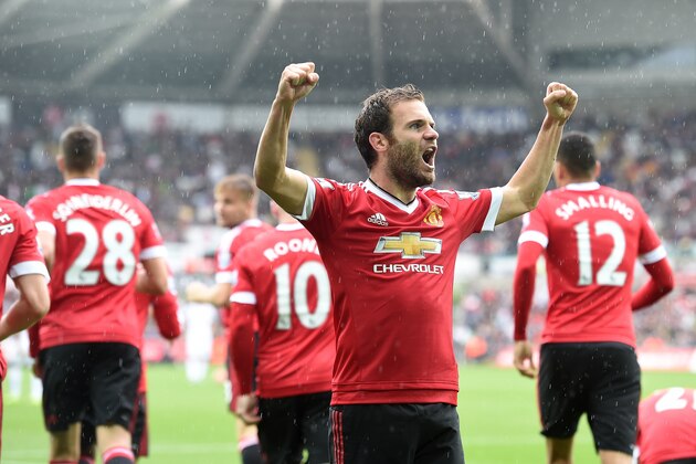 Manchester United's Spanish midfielder Juan Mata (C) celebrates his goal after scoring during the English Premier League football match between Swansea City and Manchester United at The Liberty Stadium in Swansea, south Wales on August 30, 2015. AFP PHOTO / PAUL ELLIS

RESTRICTED TO EDITORIAL USE. No use with unauthorized audio, video, data, fixture lists, club/league logos or 'live' services. Online in-match use limited to 75 images, no video emulation. No use in betting, games or single club/league/player publications.        (Photo credit should read PAUL ELLIS/AFP/Getty Images)