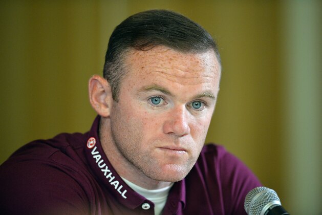 England striker Wayne Rooney attends a press conference at The Grove in Watford, north of London on September 7, 2015, ahead of their UEFA Euro 2016 qualifying football match against Switzerland at Wembley on 8 September, 2015. AFP PHOTO / GLYN KIRK

NOT FOR MARKETING OR ADVERTISING USE / RESTRICTED TO EDITORIAL USE        (Photo credit should read GLYN KIRK/AFP/Getty Images)