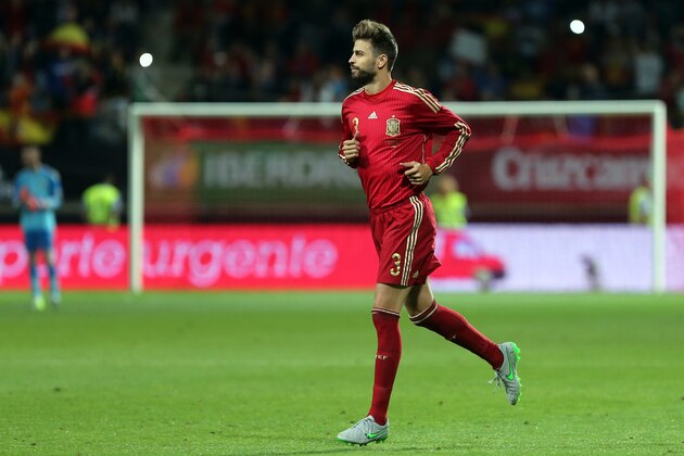 Spain's defender Gerard Pique runs during the friendly football match Spain vs Costa Rica at the Reino de Leon stadium in Leon on June 11, 2015. AFP PHOTO/ CESAR MANSO        (Photo credit should read CESAR MANSO/AFP/Getty Images)