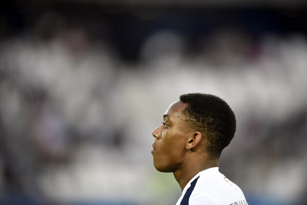 France's forward Anthony Martial looks on during the Euro 2016 friendly football match between France and Serbia on September 7, 2015, at the Nouveau Stade stadium, in Bordeaux. AFP PHOTO/ FRANCK FIFE        (Photo credit should read FRANCK FIFE/AFP/Getty Images)