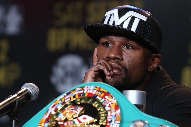 LOS ANGELES, CA - AUGUST 06:  Floyd Mayweather listens at a press conference ahead of his upcoming fight with Andre Berto at JW Marriott Los Angeles at L.A. LIVE on August 6, 2015 in Los Angeles, California.  (Photo by Stephen Dunn/Getty Images)