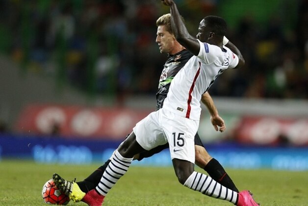 France's defender Bacary Sagna (R) vies with Portugal's midfielder Adrien Silva during the Euro 2016 friendly football match Portugal vs France at the Jose Alvalade stadium in Lisbon on September 4, 2015.   AFP PHOTO/ JOSE MANUEL RIBEIRO        (Photo credit should read JOSE MANUEL RIBEIRO/AFP/Getty Images)