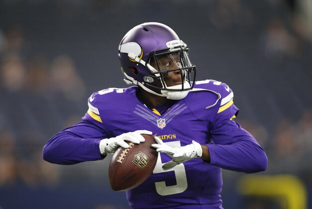 Aug 29, 2015; Arlington, TX, USA;  Minnesota Vikings quarterback Teddy Bridgewater (5) throws a pass in the warm ups before the game against the Dallas Cowboys at AT&T Stadium. Mandatory Credit: Tim Heitman-USA TODAY Sports