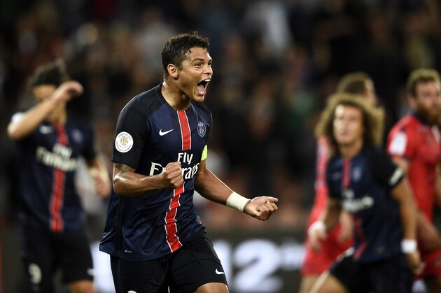 Paris Saint-Germain's Brazilian defender Thiago Silva celebrates after scoring during the French L1 football match Paris Saint-Germain FC vs GFC Ajaccio on August 16, 2015 at the Parc des Princes in Paris.  AFP PHOTO / FRANCK FIFE        (Photo credit should read FRANCK FIFE/AFP/Getty Images)