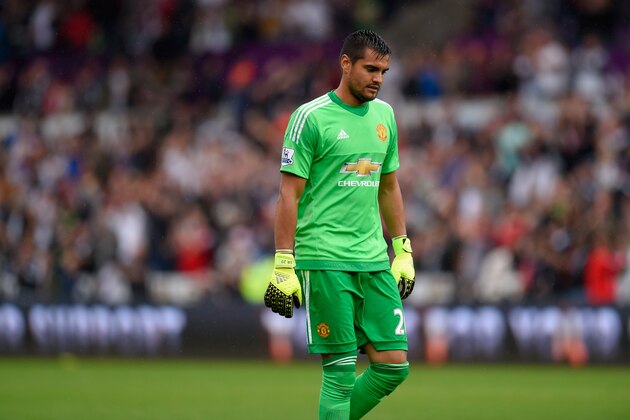 SWANSEA, WALES - AUGUST 30:  Manchester United goalkeeper Sergio Romero reacts during the Barclays Premier League match between Swansea City and Manchester United on August 30, 2015 in Swansea, United Kingdom.  (Photo by Stu Forster/Getty Images)