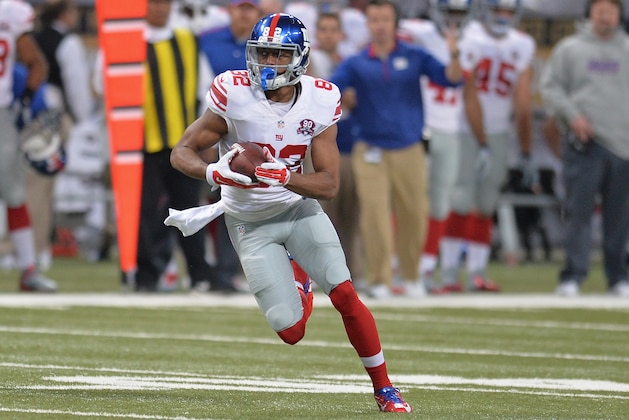 ST. LOUIS, MO - DECEMBER 21: Rueben Randle #82 of the New York Giants rushes against the St. Louis Rams at the Edward Jones Dome on December 21, 2014 in St. Louis, Missouri. (Photo by Michael Thomas/Getty Images)