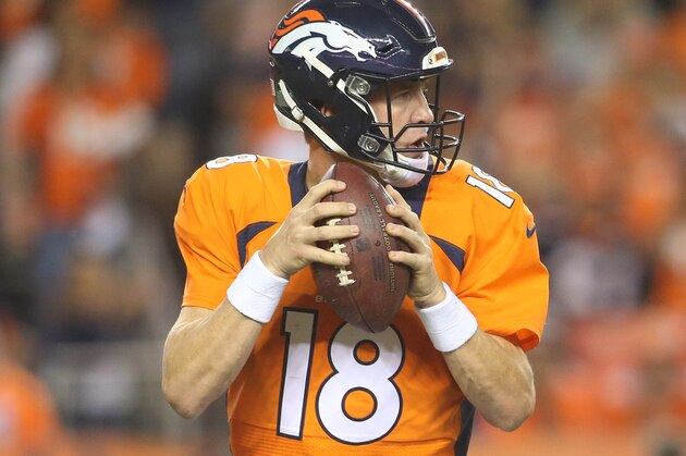 Aug 29, 2015; Denver, CO, USA; Denver Broncos quarterback Peyton Manning (18) looks to pass the ball during the first half against the San Francisco 49ers at Sports Authority Field at Mile High. Mandatory Credit: Chris Humphreys-USA TODAY Sports