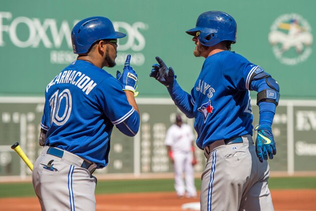 BOSTON, MA - SEPTEMBER 7: Josh Donaldson #20 of the Toronto Blue Jays celebrates with Edwin Encarnacion #10 after hitting a home run during the first inning against the Boston Red Sox at Fenway Park on September 7, 2015 in Boston, Massachusetts. (Photo by Michael Ivins/Boston Red Sox/Getty Images)