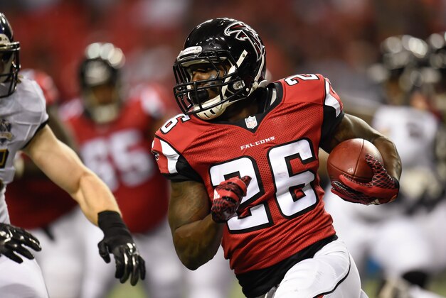 Sep 3, 2015; Atlanta, GA, USA; Atlanta Falcons running back Tevin Coleman (26) runs with the ball against the Baltimore Ravens during the first quarter at the Georgia Dome. Mandatory Credit: Dale Zanine-USA TODAY Sports