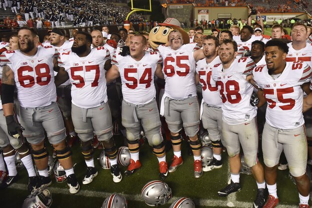 BLACKSBURG, VA - SEPTEMBER 7: Members of the Ohio State Buckeyes sing the alma mater following the game against the Virginia Tech Hokies at Lane Stadium on September 7, 2015 in Blacksburg, Virginia. Ohio State defeated Virginia Tech 42-24. (Photo by Michael Shroyer/Getty Images)