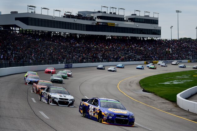 RICHMOND, VA - APRIL 26:  Chase Elliott, driver of the #25 NAPA Auto Parts Chevrolet, leads a pack of cars during the NASCAR Sprint Cup Series Toyota Owners 400 at Richmond International Raceway on April 26, 2015 in Richmond, Virginia.  (Photo by Jared C. Tilton/Getty Images)