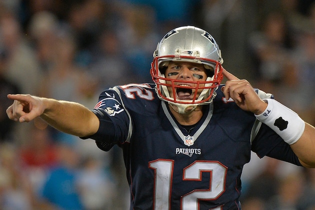 CHARLOTTE, NC - AUGUST 28:  Tom Brady #12 of the New England Patriots calls an audible against the Carolina Panthers during their preseason NFL game at Bank of America Stadium on August 28, 2015 in Charlotte, North Carolina.  (Photo by Grant Halverson/Getty Images)