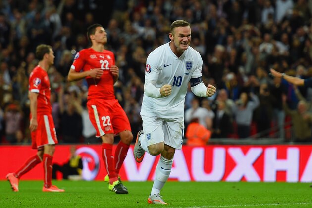 LONDON, ENGLAND - SEPTEMBER 08:  Wayne Rooney of England celebrates scoring their second goal from the penalty spot during the UEFA EURO 2016 Group E qualifying match between England and Switzerland at Wembley Stadium on September 8, 2015 in London, United Kingdom. Wayne Rooney's 50th goal breaks the record for most international goals scored for England. Sir Bobby Charlton held the record previously with 49 goals.  (Photo by Shaun Botterill/Getty Images)
