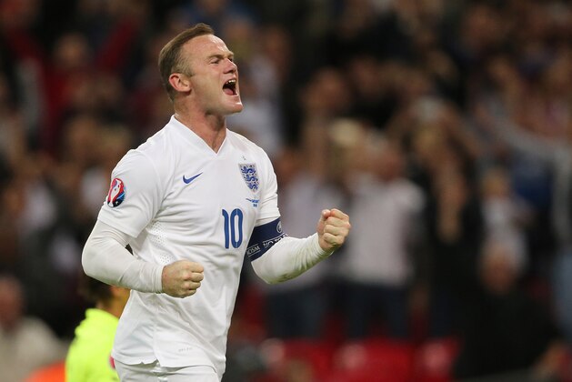 LONDON, ENGLAND - SEPTEMBER 08:  Wayne Rooney of England celebrates after scoring a goal to make it 2-0, his 50th goal for his country during the UEFA EURO 2016 Qualifier Group E - England v Switzerland on September 8, 2015 in London, United Kingdom.  (Photo by Matthew Ashton - AMA/Getty Images)