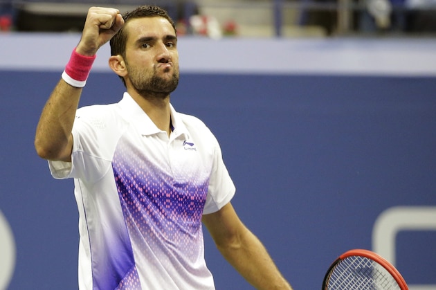 Marin Cilic, of Croatia, reacts after winning a point from Jo-Wilfried Tsonga, of France, during a quarterfinal match at the U.S. Open tennis tournament, Tuesday, Sept. 8, 2015, in New York. (AP Photo/David Goldman)