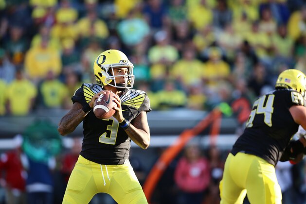 Oregon quarterback Vernon Adams Jr. (3) looks to throw during the first half of an NCAA college football game against Eastern Washington Saturday, Sept. 5, 2015, in Eugene, Ore. (AP Photo/Ryan Kang)