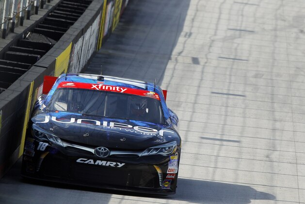 Driver Daniel Suarez comes down the back straight during qualifying for a NASCAR Xfinity Series auto race on Friday, Aug. 21, 2015 in Bristol, Tenn. (AP Photo/Wade Payne)