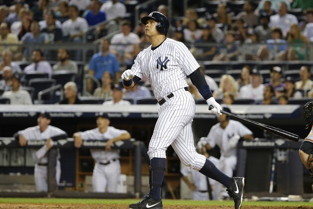 New York Yankees' Alex Rodriguez watches his home run during the sixth inning of a baseball game against the Baltimore Orioles on Tuesday, Sept. 8, 2015, in New York. (AP Photo/Frank Franklin II)